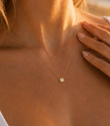 Naut & Chain Cove Diamond Circle Necklace featuring a delicate chain and a sparkling diamond circle pendant on a white background.