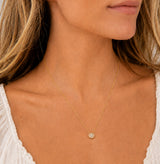 Naut & Chain Cove Diamond Circle Necklace featuring a delicate gold chain with a sparkling diamond circle pendant.