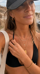 Naut & Chain Cove Diamond Circle Necklace featuring a delicate chain with a sparkling diamond-encrusted circular pendant.