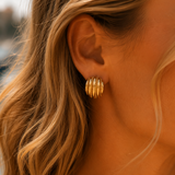 Naut & Chain The Sol Earrings featuring gold-tone hoops with intricate sunburst design, stylish jewelry for everyday wear.