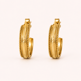 Naut & Chain The Bella Hoops earrings featuring medium-sized gold hoop design on a white background