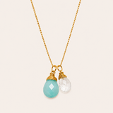 Naut & Chain Aqua Crystal Quartz necklace featuring a polished blue gemstone pendant on a delicate chain.