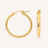 Naut & Chain medium hoop earrings featuring sleek, silver hoops with a polished finish, displayed on a neutral background.