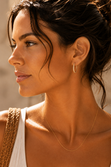 Naut & Chain Sienna Hoops earrings featuring sleek, medium-sized gold hoop design with a polished finish.