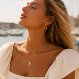 Naut & Chain The Mariner Necklace featuring a sleek silver chain with a nautical-inspired pendant.