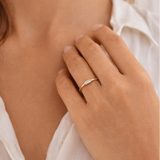 Elegant Naut & Chain Baguette Ring featuring a sleek design with sparkling baguette-cut stones on a silver band.