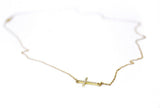 Gold Naut & Chain sideways pave diamond cross necklace featuring a horizontal cross pendant with sparkling diamonds.