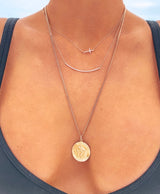 Naut & Chain The Angela diamond bar necklace featuring a sleek, elegant gold chain with a horizontal diamond bar pendant.