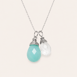 Silver Aqua Crystal Quartz Necklace by Naut & Chain featuring a smooth, polished aqua-colored quartz pendant on a delicate chain
