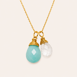 Aqua crystal quartz necklace featuring a polished aqua blue quartz pendant on a silver chain, designed by Naut & Chain.
