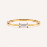 Naut & Chain Baguette Ring with rectangular-cut gemstone and sleek silver band, designed for elegant jewelry style.