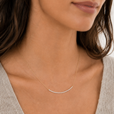 Naut & Chain diamond bar necklace featuring a sleek gold chain with a sparkling diamond bar pendant.