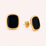 Naut & Chain Midnight Cove Stud Earrings featuring small, elegant silver studs with a subtle ocean-inspired design.