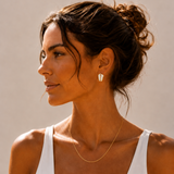 Naut & Chain Capri Earrings featuring sleek, modern hoop design with polished metal finish, stylish for everyday wear.