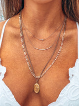 Naut & Chain The Angela diamond bar necklace featuring a sleek gold chain and a sparkling diamond bar pendant.